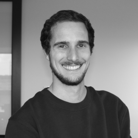 Black and white headshot of young Caucasian male.